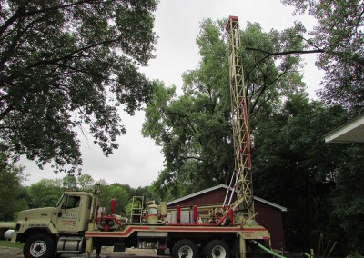 Our drillers skillfully maneuver our state-of-the-art-drill rig to avoid damaging surrounding trees and buildings.