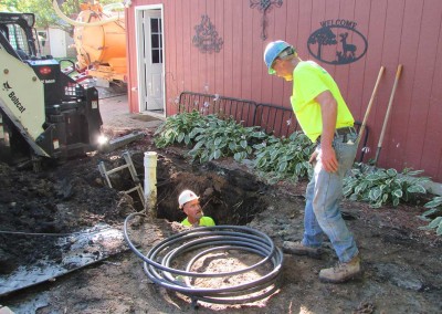 After digging the trench our technicians connect the well pump to the pressure tank using waterline.