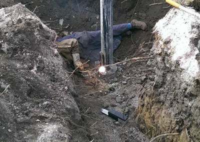 Our onsite service technician is welding up a pitless on a double cased well